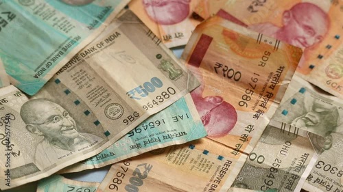 100 or 200 and 500 rupees and 2,000 rupees,Background of paper Indian money,growth in money,new Indian Paper currency