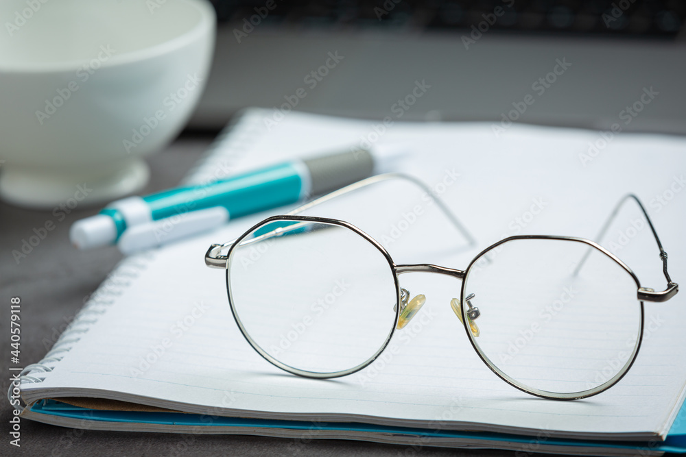 Glasses are placed on the ground of the world vision day concept board. Glasses are placed on the ground of the world vision day concept board.
