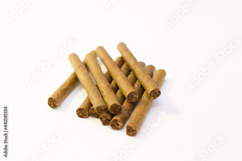 Natural cigarillo isolated on the white background