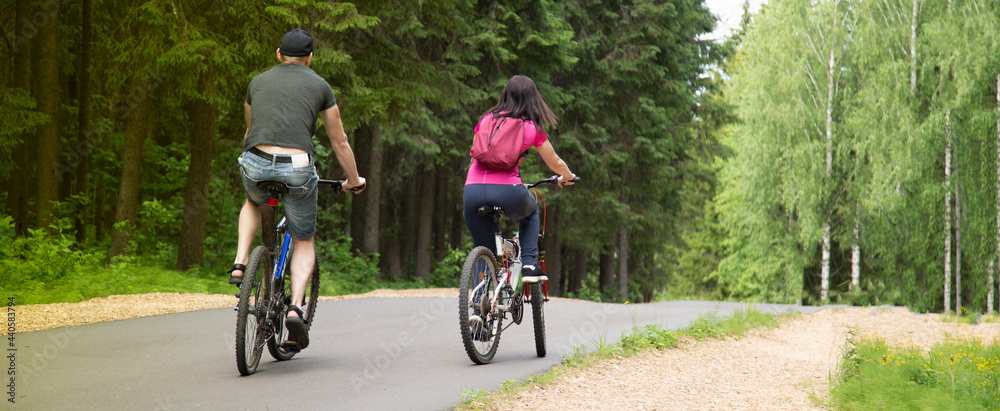 Fototapeta premium Bike ride in the forest. Outdoor recreation on bicycles.