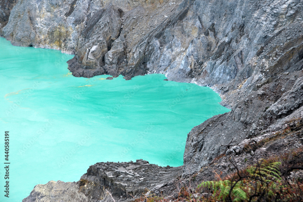Blue sulfur lake texture background at Kawah Ijen , Indonesia - Abstract blue nature of mining sulfer backdrop Blue sulfur lake texture background at Kawah Ijen , Indonesia - Abstract blue nature of mining sulfer backdrop