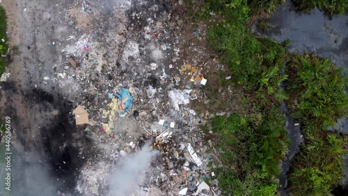 Air pollution due to open burn garbage at rural area.