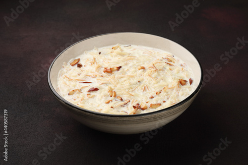 Khir or kheer payasam also known as Sheer Khurma Seviyan consumed especially on Eid or any other festival in india/asia. Served with dry fruits toppings  photo