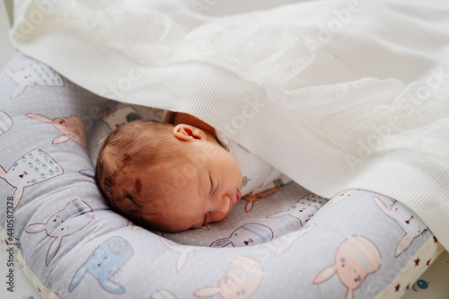 The newborn baby sleeps. healthy children's sleep.  photo