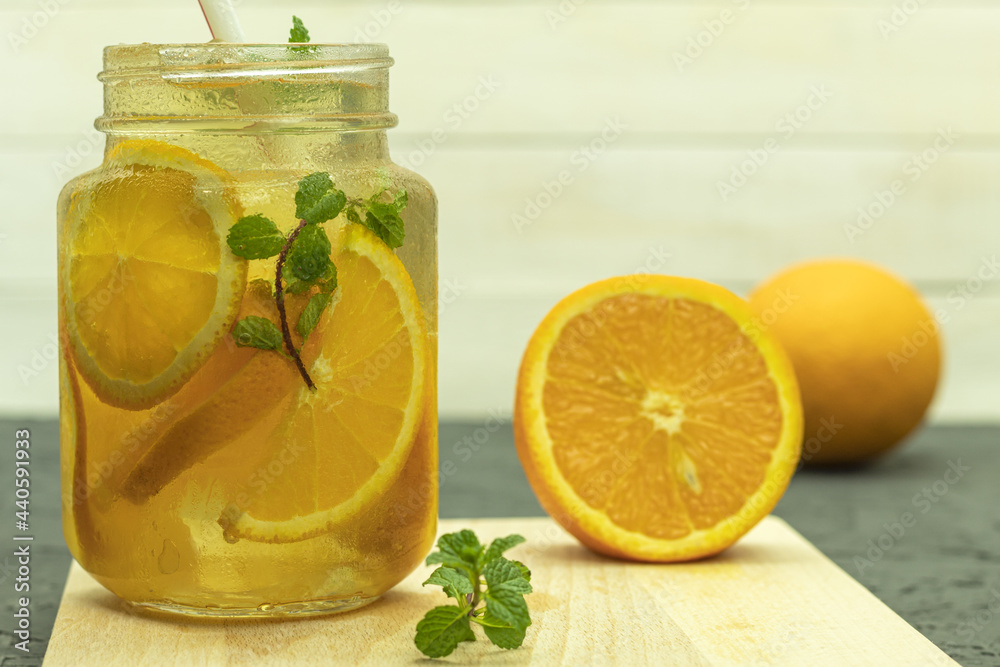 Cool lemonade made from orange and lime slices Cool lemonade made from orange and lime slices
