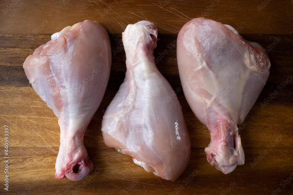 raw uncooked skinless chicken leg