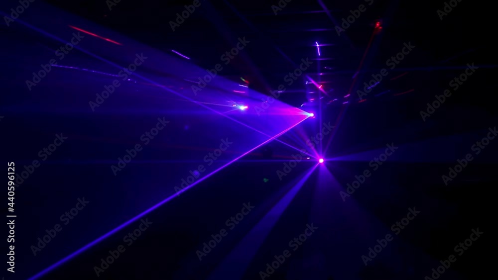 Disco light with blue laser flashing lights, flashing laser bright light in the dark