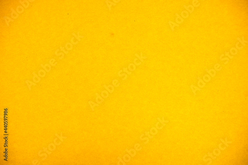 Yellow background. Antique. Suitable for backgrounds. The texture of the cardboard.