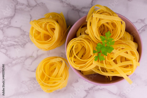 Fresh Italian tagliatelle pasta. Flat lei.