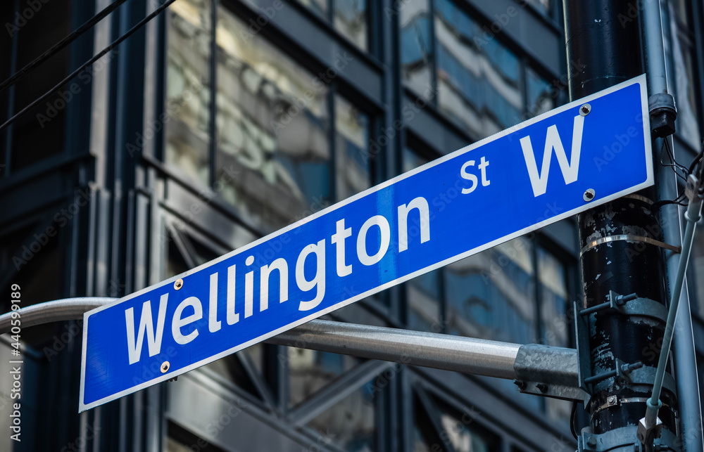 Fototapeta premium Wellington street west sign in downtown Toronto.