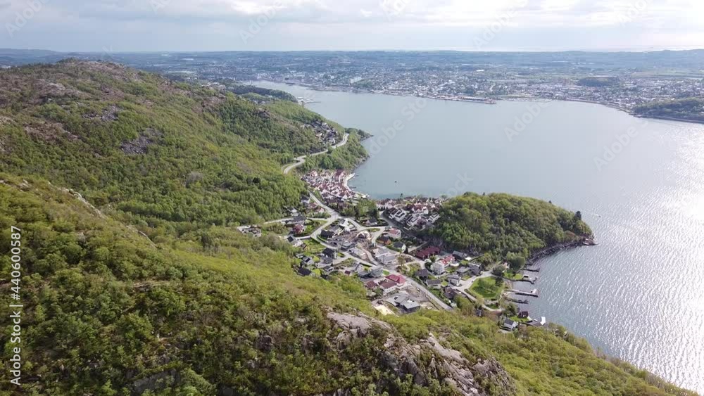 Aerial panorama drone view of beautiful fishing harbor in Stavanger Norway. Mountain top view of boats traveling fjord. Norway, Scandinavia, northern Europe Aerial panorama drone view of beautiful fishing harbor in Stavanger Norway. Mountain top view of boats traveling fjord. Norway, Scandinavia, northern Europe