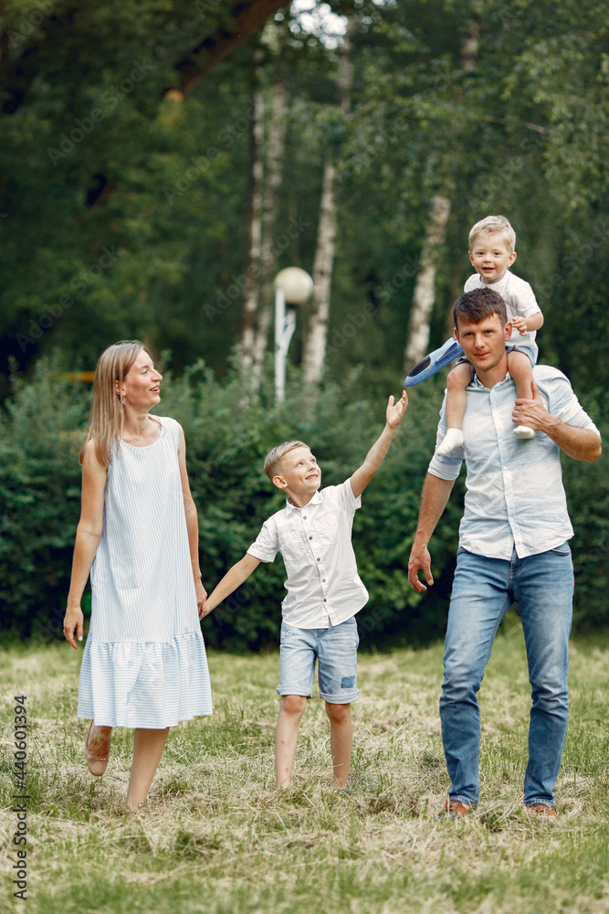 Family walks in a field and playing with toy plane Family walks in a field and playing with toy plane