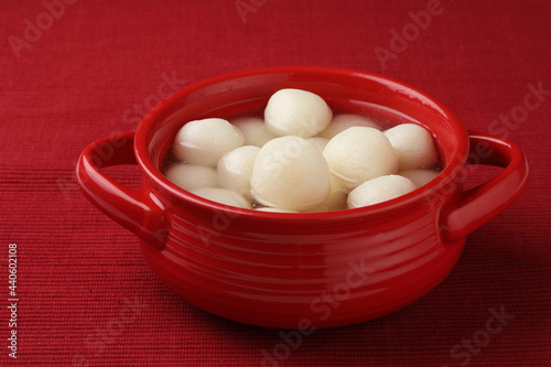 This dessert is called Rasgulla or Rosogolla, Indian Sweet ,Famous Bengali sweet photo