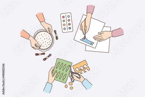 Children entertainment and leisure concept. Diverse kids hands creating craftworks painting, scrapbooking, embroidering during workshop vector illustration 