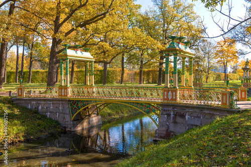 One of the oldest twin Chinese bridges in the Golden Autumn. Alexander Park of theTsarskoe Selo. Suburbs of St. Petersburg, Russia