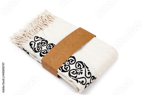 Peshtemal Turkish towel folded colorful textile for spa, beach, pool, light travel, healthy fashion and gifts. Traditional turkish bath material, handmade, beige and stone look photo