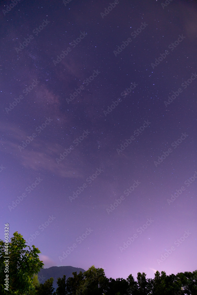 Naklejka premium night sky Milky Way over the mountain in the clear sky