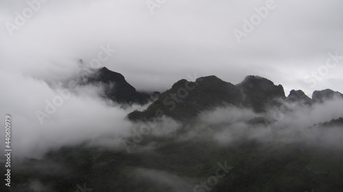 Beautiful view of high mountain with fog in the morning for natural view and inspirational concept 