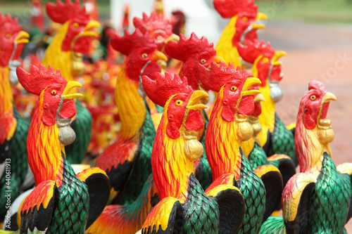 Many rooster statues in King Naresuan the great shrine, Phitsanulok, Thailand. © noomcm