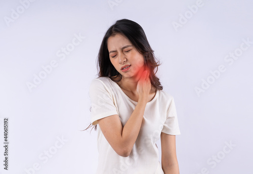 Portrait of Asian woman with neck pain isolated on white background