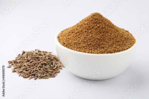 cumin seeds and cumin ground, powder photo