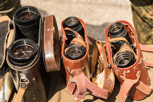 Old army binoculars from the second world war in leather cases