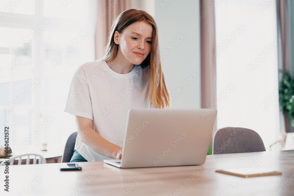 A student studying in a tablet is surfing the internet in the living room. A smart freelancer sits in a new apartment holding a gadget in his hands. Woman shopping online ordering home groceries. A student studying in a tablet is surfing the internet in the living room. A smart freelancer sits in a new apartment holding a gadget in his hands. Woman shopping online ordering home groceries.