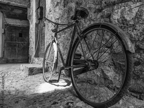 Old Bicycle in an alley of an Italian village
