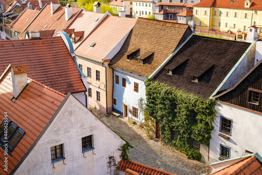 Top view on the green and small houses in old town in Cesky Krumlov, Czech Republic. 