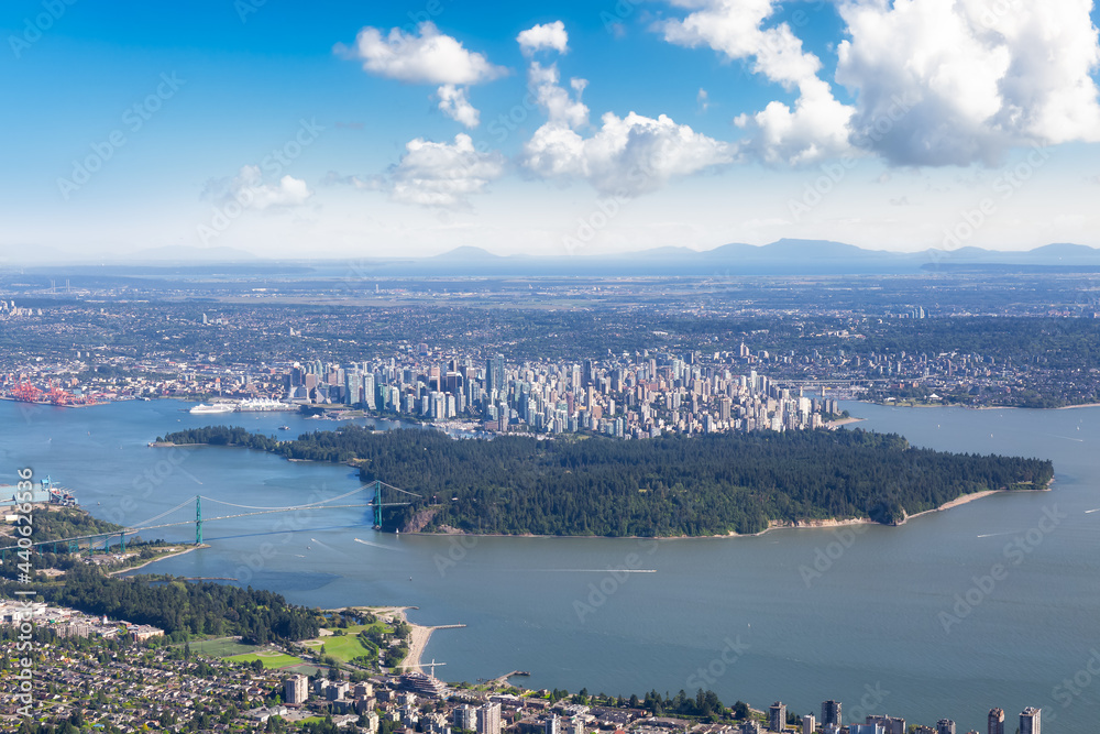 Aerial View of Lions Gate Bridge, Stanley Park and Vancouver Downtown, British Columbia, Canada. Colorful Blue Cloudy Sky Artistic Render