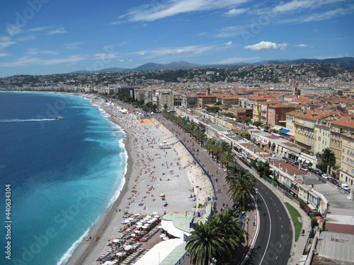 Aerial view of the city. Panoranic landscape of seaside promenade in the old town in Nice, France. People enjoy life on vacation on the Cote d'Azur.