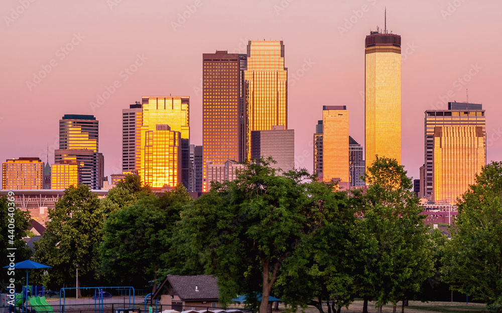 The skylines of downtown Minneapolis under golden hour	