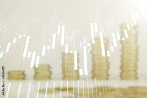 Multi exposure of virtual creative financial chart hologram on growing stacks of coins background, research and analytics concept