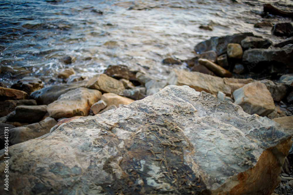 Seascape, huge stones in the sandy tidal waves. Seascape, huge stones in the sandy tidal waves.