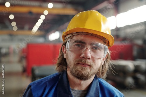 Portrait of factory man in goggles