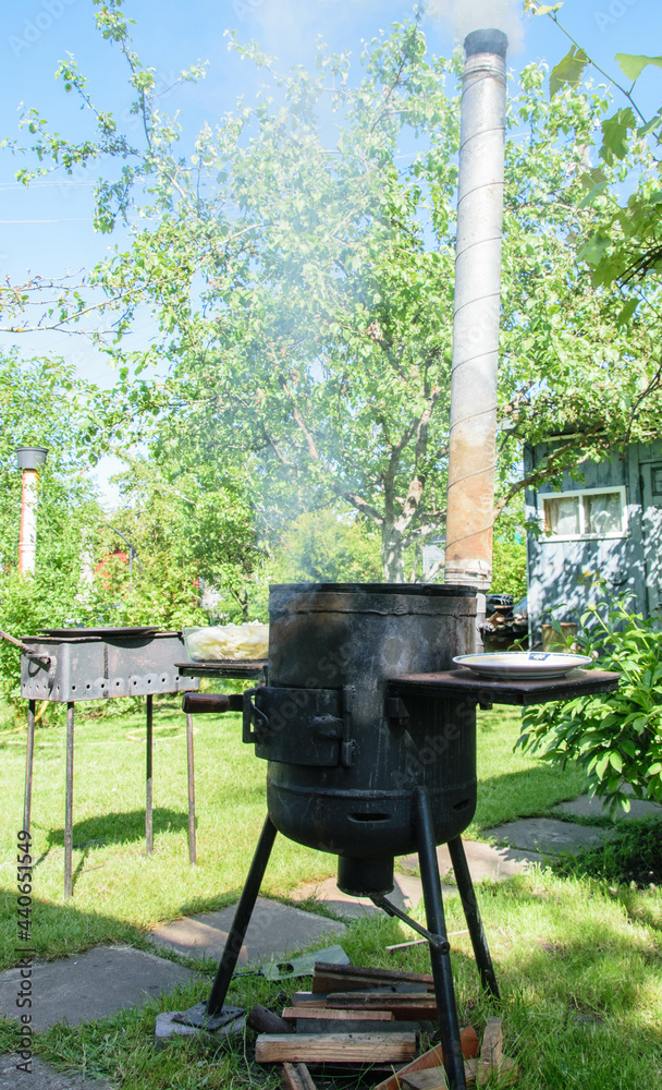 Homemade grill for cooking pilaf in the summer cottage.