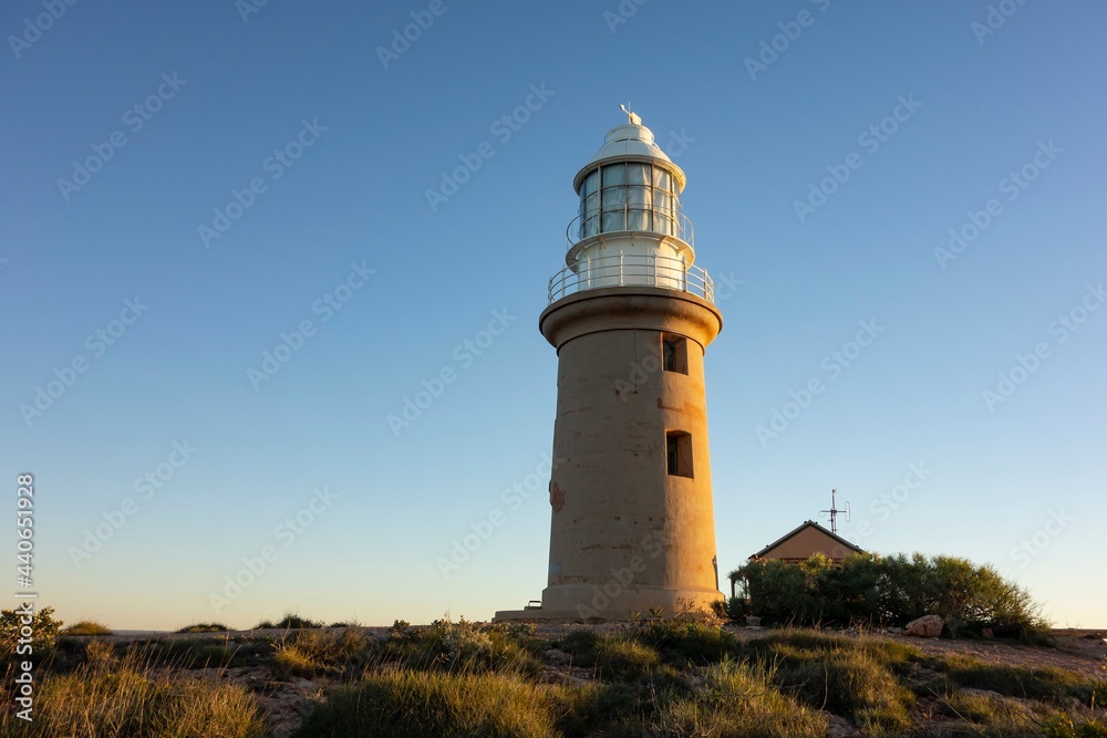 Lighthouse building in Western Australia near Exmouth during sunset