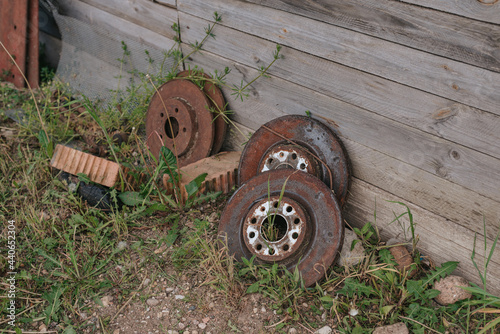 Rusty brake discs for cars. Old car parts. Replacing old brake discs with new ones. Car repair shop