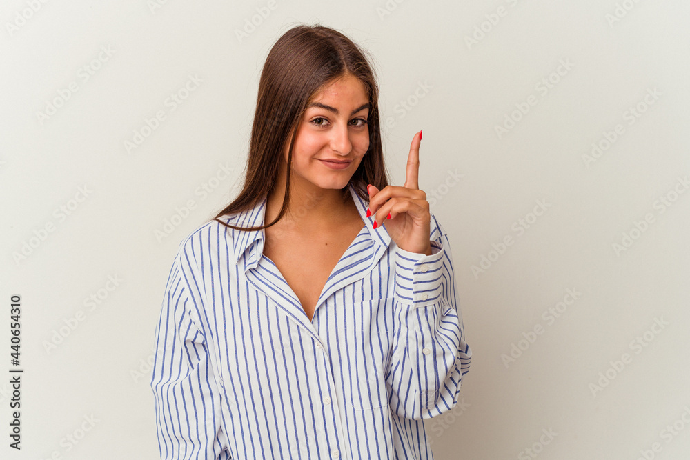 Young caucasian woman isolated on white background who feels sad and pensive, looking at copy space.