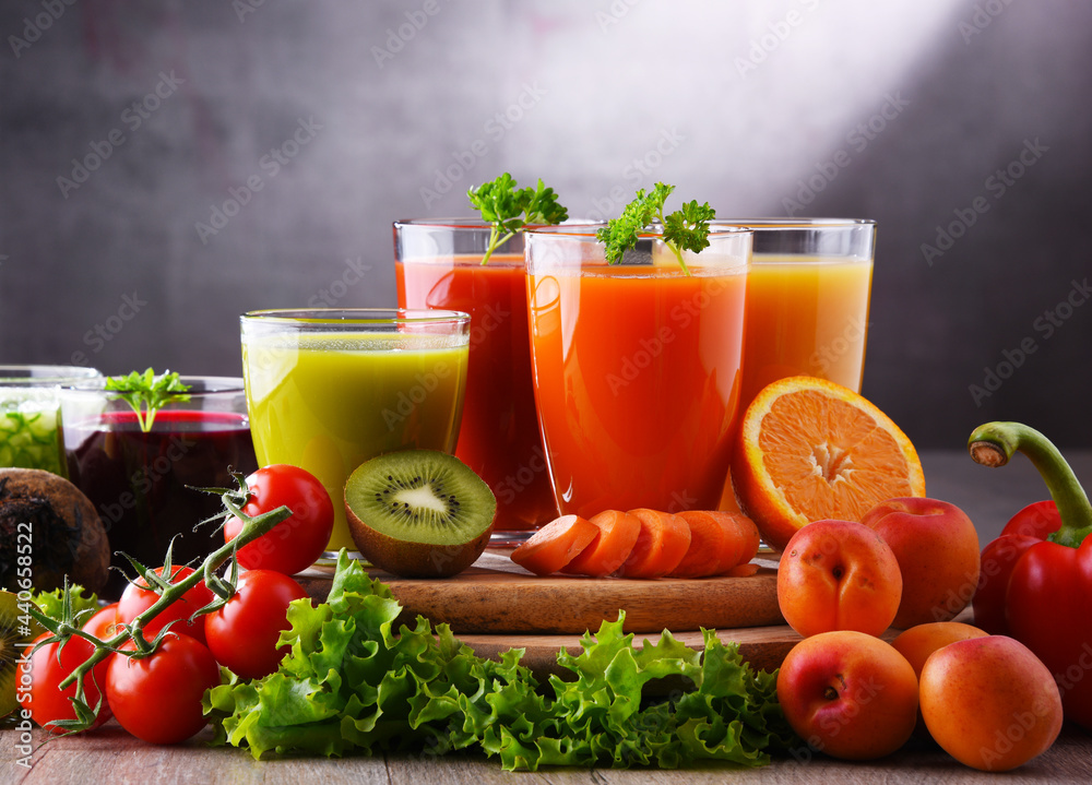 Glasses with fresh organic vegetable and fruit juices Glasses with fresh organic vegetable and fruit juices