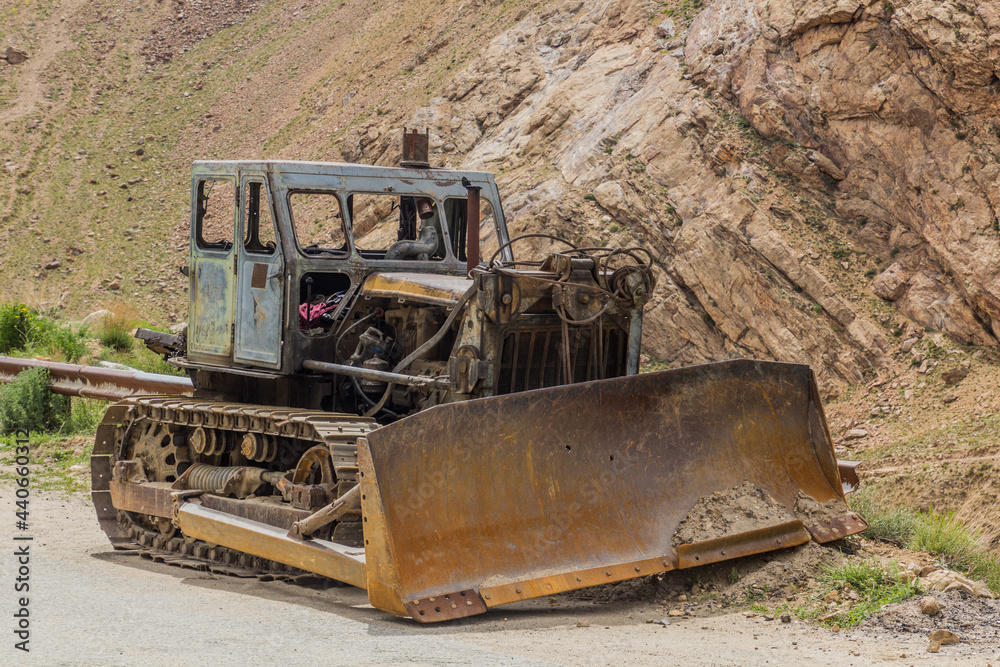 Bulldozer on a road in Wakhan valley, Tajikistan