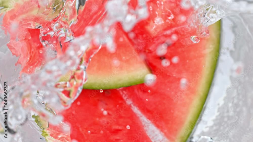Super Slow Motion Shot of Melon Slices Falling Into Water Whirl at 1000 fps. Super Slow Motion Shot of Melon Slices Falling Into Water Whirl at 1000 fps.