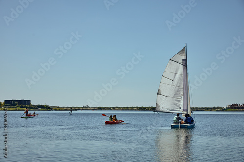 Boats sailing in a beautiful lake