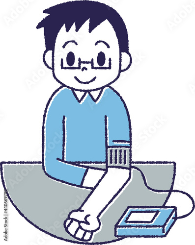 血圧を測定している男性