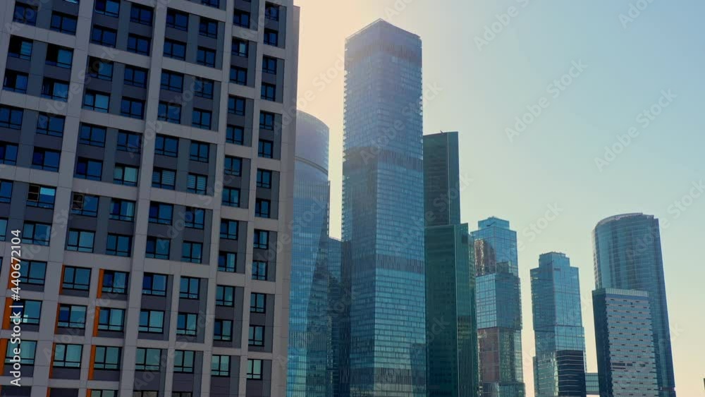 The famous business center Moscow city. The Moscow mirror business center in the form of several high-rise buildings is crazy. aerial view at sunrise The famous business center Moscow city. The Moscow mirror business center in the form of several high-rise buildings is crazy. aerial view at sunrise