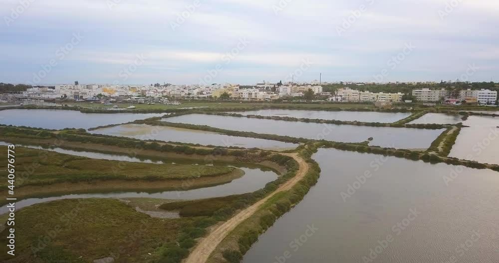 Aerial view over the Ria Formosa wetland areas of Fuseta fishing village, Portugal Aerial view over the Ria Formosa wetland areas of Fuseta fishing village, Portugal