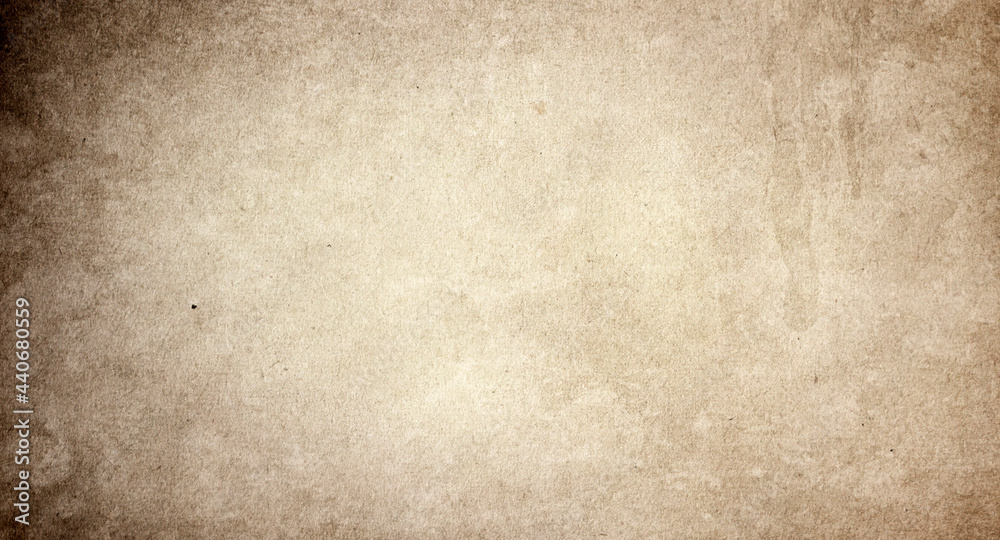 Grunge background of brown paper with vintage texture and spots