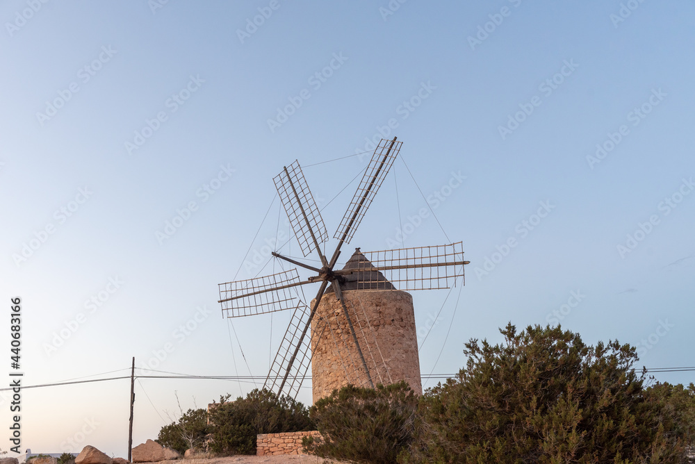 Silhouettes of the mill of Jeroni, Sa Miranda on the island of Formentera in Spain
