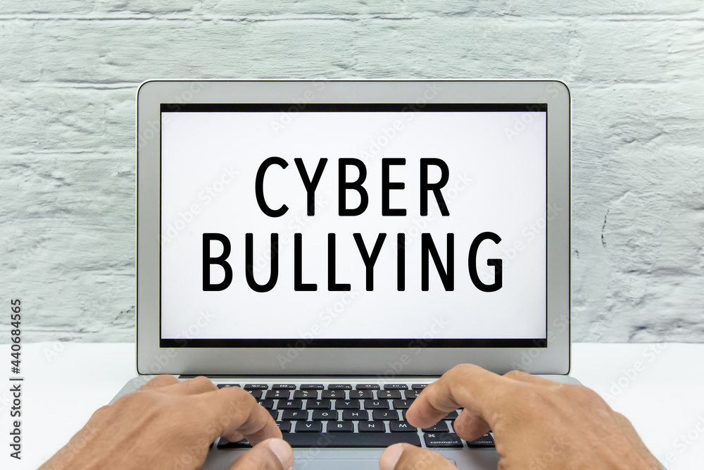 Cyber Bullying concept on a laptop screen. Cyber Bullying concept on a laptop screen.