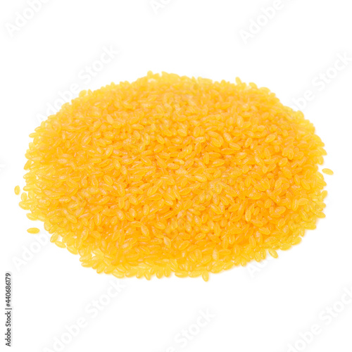 Golden rice on white background